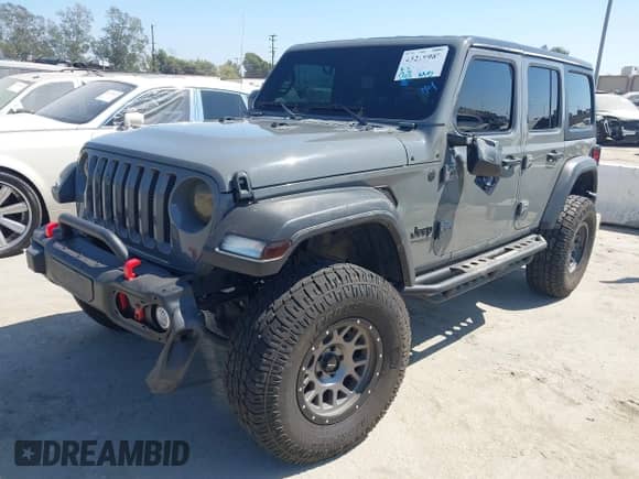 2022 Jeep Wrangler Unlimited Sport S with VIN 1C4HJXDG7NW144553, listed as a IAAI auction lot 43219987 with 25,211 mi miles and . Bid and sale history available at DreamBid. Image 2.
