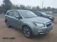 2018 Subaru Forester Premium z VIN JF2SJAEC2JH586302, wystawiony jako IAAI lot #43186549 z przebiegiem 122 233 mil mil oraz . Historia ofert i sprzedaży dostępna na DreamBid. Obrazek 1.