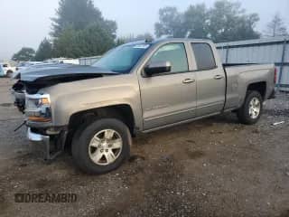 2017 Chevrolet Silverado 1500 LT with VIN 1GCVKREH0HZ207014, listed as a Copart auction lot 81922155 with 189,699 mi miles and Salvage title. Bid and sale history available at DreamBid. Image 1.