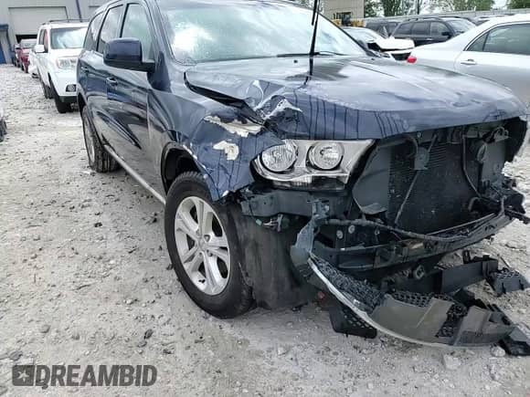 2013 Dodge Durango SXT with VIN 1C4RDJAG1DC662932, listed as a Copart auction lot 57784465 with 189,398 mi miles and Clean title. Bid and sale history available at DreamBid. Image 15.