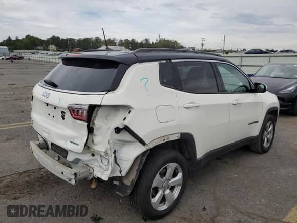2018 Jeep Compass Latitude with VIN 3C4NJDBB9JT251810, listed as a Copart auction lot 80884855 with 69,847 mi miles and Salvage title. Bid and sale history available at DreamBid. Image 3.