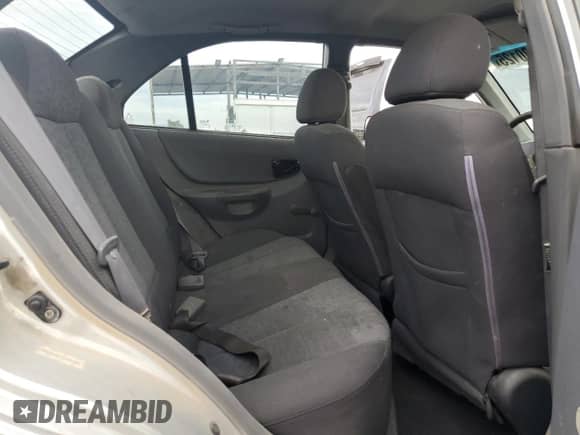 2005 Hyundai Accent GLS z VIN KMHCG45C25U604342, wystawiony jako Copart lot #85380125 z przebiegiem 165 690 mil mil oraz Czysty tytuł • Clean title. Historia ofert i sprzedaży dostępna na DreamBid. Obrazek 10.