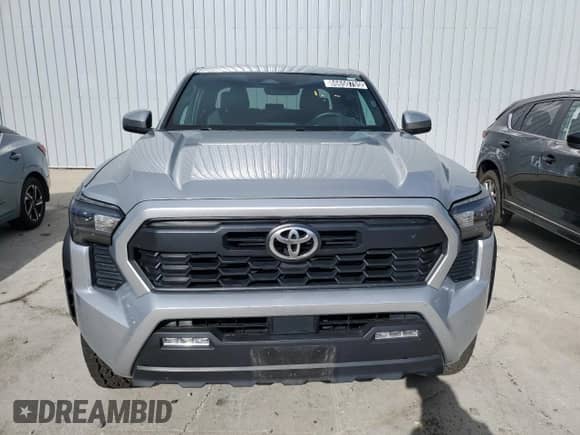 2024 Toyota Tacoma TRD Off Road with VIN 3TMLB5JN6RM029446, listed as a Copart auction lot 86650705 with 27,292 mi miles and Clean title. Bid and sale history available at DreamBid. Image 5.