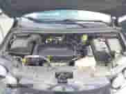 2014 Chevrolet Sonic LT z VIN 1G1JC5SH7E4137635, wystawiony jako IAAI lot #43083539 z przebiegiem 176 334 mil mil oraz . Historia ofert i sprzedaży dostępna na DreamBid. Obrazek 10.