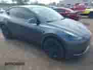 2023 Tesla Model Y Long Range with VIN 7SAYGDEE4PA202135, listed as a IAAI auction lot 42975478 with 27,065 mi miles and . Bid and sale history available at DreamBid. Image 1.