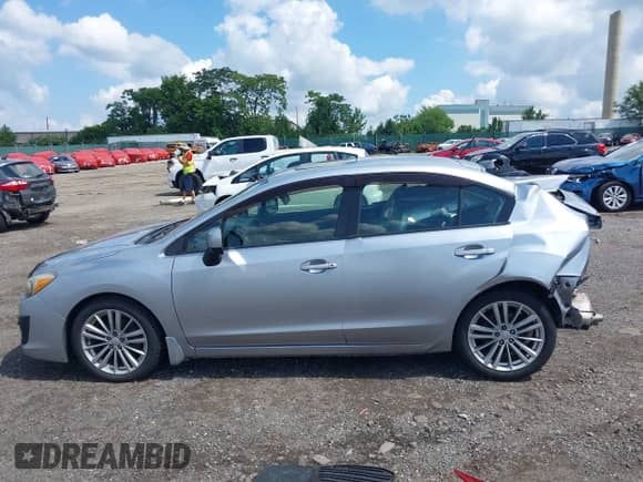 2012 Subaru Impreza Premium with VIN JF1GJAD60CH021698, listed as a IAAI auction lot 42740681 with 51,911 mi miles and . Bid and sale history available at DreamBid. Image 15.