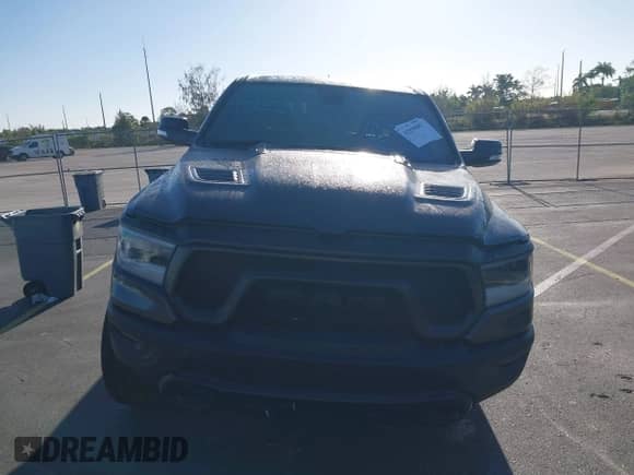 2019 Ram 1500 Rebel z VIN 1C6RRELT8KN549233, wystawiony jako IAAI lot #41830807 z przebiegiem 110 335 mil mil oraz . Historia ofert i sprzedaży dostępna na DreamBid. Obrazek 13.