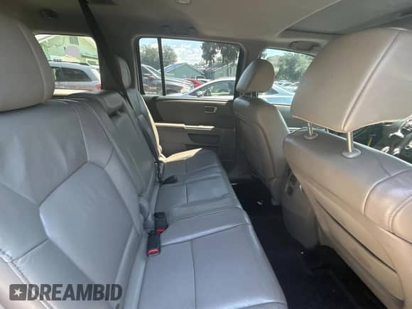 2013 Honda Pilot EX-L z VIN 5FNYF3H5XDB021433, wystawiony jako Copart lot #70961935 z przebiegiem 215 844 mil mil oraz Czysty tytuł • Clean title. Historia ofert i sprzedaży dostępna na DreamBid. Obrazek 6.