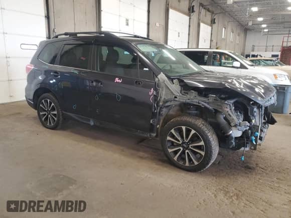 2017 Subaru Forester Premium with VIN JF2SJGEC9HH418735, listed as a Copart auction lot 81337315 with 143,186 mi miles and Salvage title. Bid and sale history available at DreamBid. Image 4.