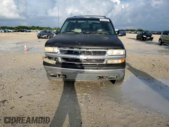 2001 Chevrolet Suburban LT with VIN 3GNGC26U21G119300, listed as a Copart auction lot 68131044 with 147,430 mi miles and Salvage title. Bid and sale history available at DreamBid. Image 12.