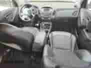 2015 Hyundai Tucson SE z VIN KM8JUCAG9FU991153, wystawiony jako Copart lot #63429555 z przebiegiem 160 649 mil mil oraz Szkoda całkowita • Salvage title. Historia ofert i sprzedaży dostępna na DreamBid. Obrazek 8.