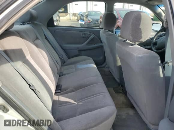 2000 Toyota Camry CE z VIN 4T1BG22K5YU002339, wystawiony jako Copart lot #69605655 z przebiegiem 319 259 mil mil oraz Szkoda całkowita • Salvage title. Historia ofert i sprzedaży dostępna na DreamBid. Obrazek 10.