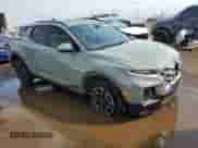 2023 Hyundai Santa Cruz SEL Premium with VIN 5NTJDDAF3PH048478, listed as a Copart auction lot 69555054 with 23,552 mi miles and Salvage title. Bid and sale history available at DreamBid. Image 4.