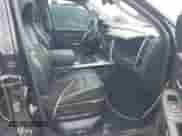 2014 Ram 1500 Laramie z VIN 1C6RR7NM7ES353887, wystawiony jako IAAI lot #42349659 z przebiegiem 206 055 mil mil oraz . Historia ofert i sprzedaży dostępna na DreamBid. Obrazek 5.