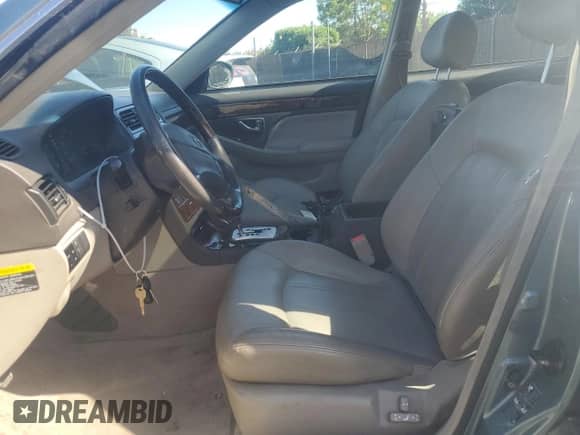 2002 Hyundai XG L with VIN KMHFU45E12A206222, listed as a Copart auction lot 57001405 with 89,116 mi miles and Clean title. Bid and sale history available at DreamBid. Image 7.