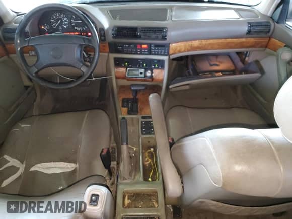 1993 BMW 7 Series с VIN WBAGD4320PDE61578, выставлен на аукционе Copart как лот 74251224 с пробегом Не указан миль и Списание • Salvage title. История ставок и продаж доступна на DreamBid. Изображение 8.