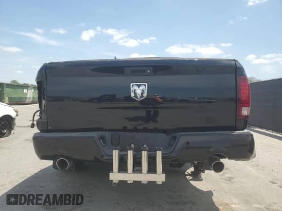 2014 Ram 1500 Sport with VIN 1C6RR6HT1ES372352, listed as a Copart auction lot 54484735 with 104,236 mi miles and Salvage title. Bid and sale history available at DreamBid. Image 6.