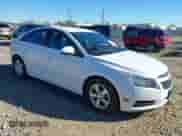 2013 Chevrolet Cruze LT with VIN 1G1PK5SB4D7251016, listed as a IAAI auction lot 43334096 with 141,322 mi miles and . Bid and sale history available at DreamBid. Image 1.