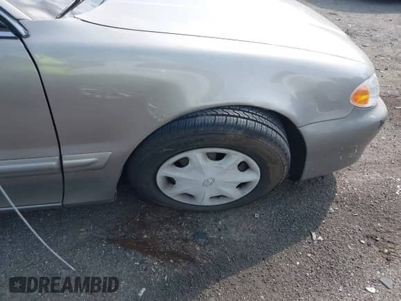 1998 Hyundai Sonata z VIN KMHCF24F4WA126625, wystawiony jako IAAI lot #42401944 z przebiegiem 37 690 mil mil oraz . Historia ofert i sprzedaży dostępna na DreamBid. Obrazek 6.