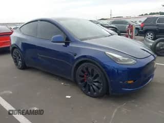 2021 Tesla Model Y Performance with VIN 5YJYGDEFXMF194711, listed as a IAAI auction lot 43224122 with 90,452 mi miles and . Bid and sale history available at DreamBid. Image 1.