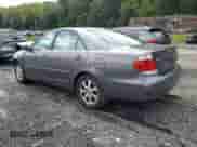2005 Toyota Camry XLE с VIN 4T1BF30K25U606132, выставлен на аукционе Copart как лот 81264195 с пробегом 200 159 миль миль и Списание • Salvage title. История ставок и продаж доступна на DreamBid. Изображение 2.