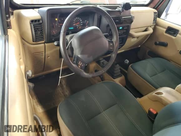 2001 Jeep Wrangler Sahara z VIN 1J4FA59S11P334534, wystawiony jako Copart lot #90651005 z przebiegiem 155 822 mil mil oraz Czysty tytuł • Clean title. Historia ofert i sprzedaży dostępna na DreamBid. Obrazek 8.