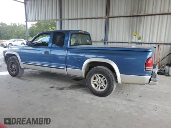 2004 Dodge Dakota SLT with VIN 1D7GL42N14S676687, listed as a Copart auction lot 72150124 with 162,913 mi miles and Salvage title. Bid and sale history available at DreamBid. Image 2.