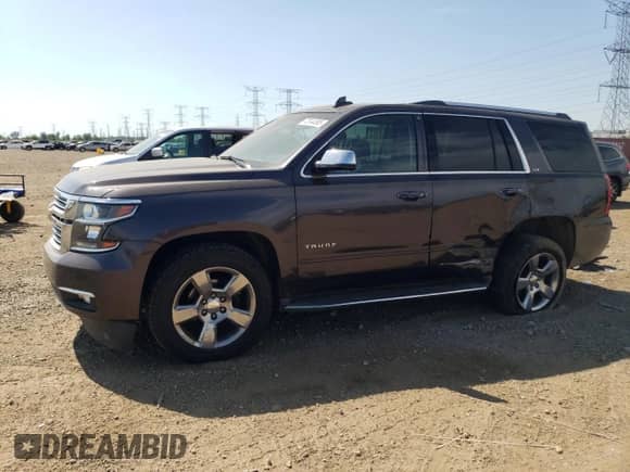 2015 Chevrolet Tahoe LTZ с VIN 1GNSKCKC1FR648891, выставлен на аукционе Copart как лот 72044585 с пробегом 108 125 миль миль и Списание • Salvage title. История ставок и продаж доступна на DreamBid. Изображение 1.