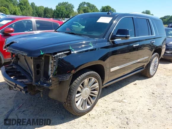 2015 Cadillac Escalade Platinum z VIN 1GYS4PKJ6FR695160, wystawiony jako IAAI lot #42664381 z przebiegiem 135 569 mil mil oraz . Historia ofert i sprzedaży dostępna na DreamBid. Obrazek 2.