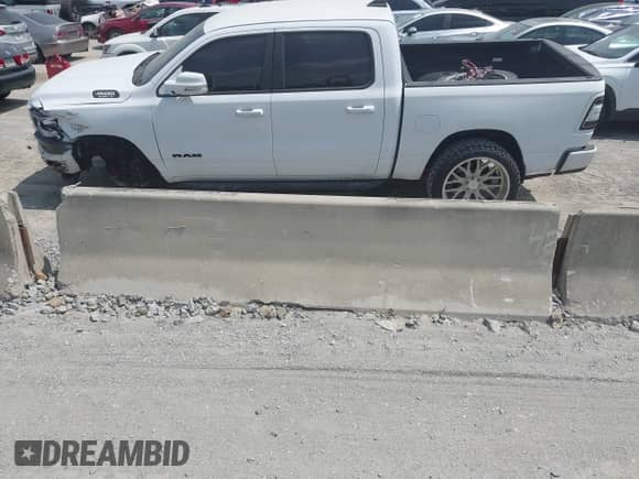 2019 Ram 1500 Big Horn with VIN 1C6RREFT0KN514083, listed as a IAAI auction lot 43016483 with 53,702 mi miles and . Bid and sale history available at DreamBid. Image 14.