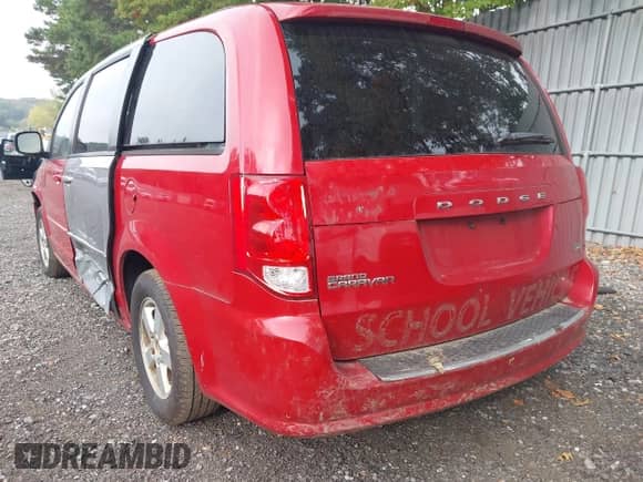 2012 Dodge Grand Caravan SXT with VIN 2C4RDGCG7CR296447, listed as a IAAI auction lot 43280546 with 55,551 mi miles and . Bid and sale history available at DreamBid. Image 3.