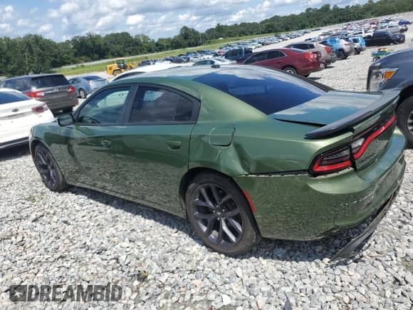 2020 Dodge Charger SXT with VIN 2C3CDXBG8LH133243, listed as a Copart auction lot 69006985 with 89,081 mi miles and Salvage title. Bid and sale history available at DreamBid. Image 2.