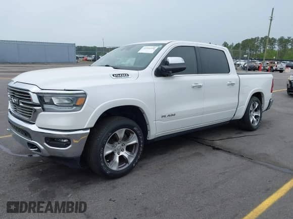 2021 Ram 1500 Laramie with VIN 1C6RREJT1MN709653, listed as a IAAI auction lot 41951192 with 39,688 mi miles and . Bid and sale history available at DreamBid. Image 21.