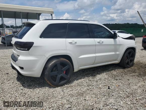 2014 Jeep Grand Cherokee SRT-8 z VIN 1C4RJFDJ2EC242210, wystawiony jako Copart lot #60677855 z przebiegiem 68 050 mil mil oraz Szkoda całkowita • Salvage title. Historia ofert i sprzedaży dostępna na DreamBid. Obrazek 3.