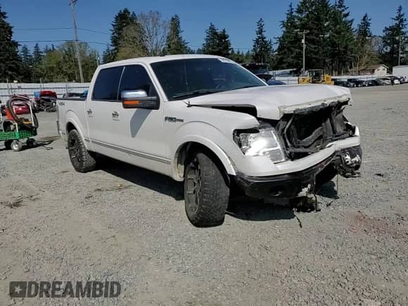2012 Ford F-150 Lariat with VIN 1FTFW1E64CFA97250, listed as a Copart auction lot 54375405 with 219,093 mi miles and Salvage title. Bid and sale history available at DreamBid. Image 13.