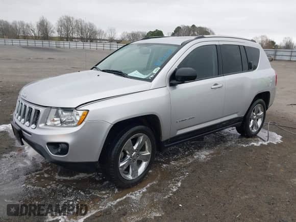 2012 Jeep Compass Limited z VIN 1C4NJCCB3CD511555, wystawiony jako IAAI lot #41752339 z przebiegiem 128 435 mil mil oraz . Historia ofert i sprzedaży dostępna na DreamBid. Obrazek 18.