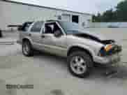 2003 Chevrolet Blazer LS with VIN 1GNDT13X53K140312, listed as a Copart auction lot 68031625 with 183,619 mi miles and Salvage title. Bid and sale history available at DreamBid. Image 4.