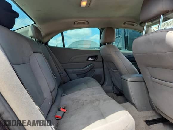 2015 Chevrolet Malibu LS z VIN 1G11B5SL4FF127769, wystawiony jako Copart lot #61566435 z przebiegiem 180 791 mil mil oraz Szkoda całkowita • Salvage title. Historia ofert i sprzedaży dostępna na DreamBid. Obrazek 10.