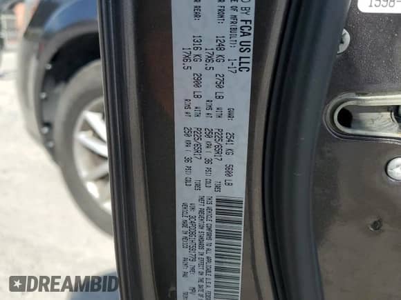 2017 Dodge Journey SXT with VIN 3C4PDDBG1HT591779, listed as a Copart auction lot 80312965 with 107,330 mi miles and Salvage title. Bid and sale history available at DreamBid. Image 13.
