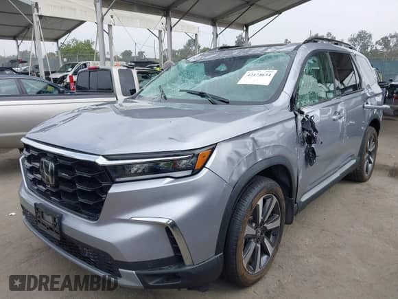 2023 Honda Pilot Touring с VIN 5FNYG1H78PB030638, выставлен на аукционе IAAI как лот 42474634 с пробегом 25 513 миль миль и . История ставок и продаж доступна на DreamBid. Изображение 17.