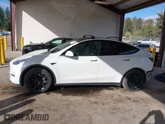 2021 Tesla Model Y Long Range with VIN 5YJYGDEE6MF138868, listed as a IAAI auction lot 43401839 with 134,786 mi miles and . Bid and sale history available at DreamBid. Image 15.