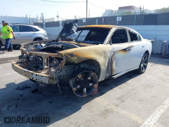 2017 Dodge Charger SXT with VIN 2C3CDXHG7HH567538, listed as a IAAI auction lot 42312246 with Not provided miles and . Bid and sale history available at DreamBid. Image 2.