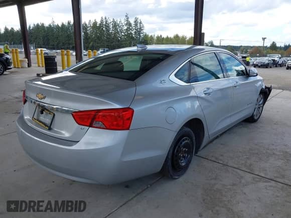 2017 Chevrolet Impala LT with VIN 2G1105S37H9105766, listed as a IAAI auction lot 43342969 with 146,627 mi miles and . Bid and sale history available at DreamBid. Image 4.
