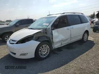 2010 Toyota Sienna XLE с VIN 5TDYK4CC2AS312328, выставлен на аукционе Copart как лот 71203025 с пробегом 182 360 миль миль и Списание • Salvage title. История ставок и продаж доступна на DreamBid. Изображение 1.