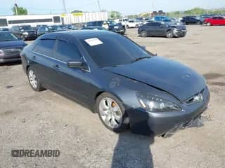 2005 Honda Accord EX with VIN 1HGCM55735A117613, listed as a IAAI auction lot 42231256 with 241,219 mi miles and . Bid and sale history available at DreamBid. Image 1.