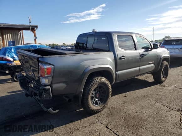 2023 Toyota Tacoma SR with VIN 3TMCZ5ANXPM559511, listed as a Copart auction lot 80508385 with 33,176 mi miles and Salvage title. Bid and sale history available at DreamBid. Image 3.