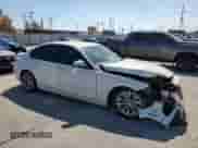 2016 BMW 3 Series 320i with VIN WBA8A9C59GK617288, listed as a Copart auction lot 83758035 with 61,547 mi miles and Salvage title. Bid and sale history available at DreamBid. Image 4.