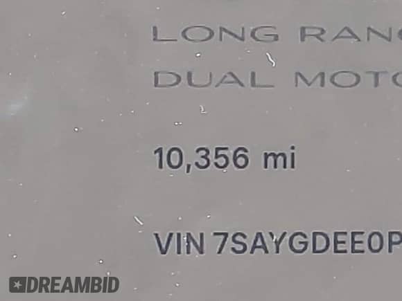 2023 Tesla Model Y Long Range z VIN 7SAYGDEE0PA201841, wystawiony jako IAAI lot #43158634 z przebiegiem 10 356 mil mil oraz . Historia ofert i sprzedaży dostępna na DreamBid. Obrazek 15.
