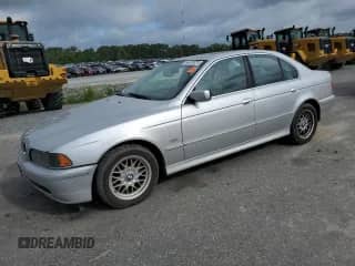 2001 BMW 5 Series 525i with VIN WBADT43441GX21054, listed as a Copart auction lot 64241655 with 180,756 mi miles and Salvage title. Bid and sale history available at DreamBid. Image 1.