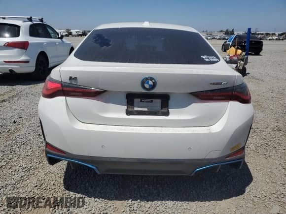 2022 BMW i4 eDrive40 with VIN WBY73AW04NFN12057, listed as a Copart auction lot 67297925 with 69,670 mi miles and Salvage title. Bid and sale history available at DreamBid. Image 6.